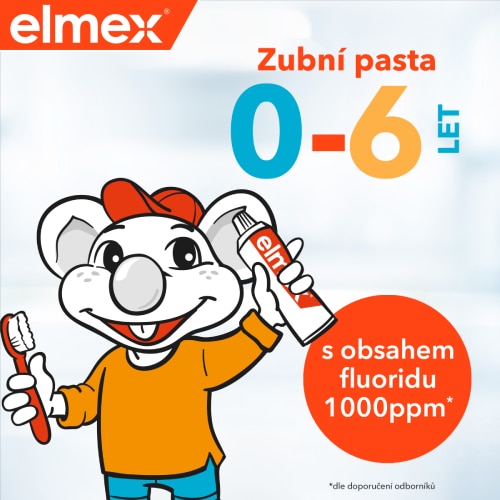 Myška elmex držící zubní pastu spolu se zubním kartáčkem a zmíněný vhodný věk užití pro děti ve věku 0-6 let. Rovněž je zde také zmíněň obsah fluoridu v zubní pastě, který je 1000ppm.
